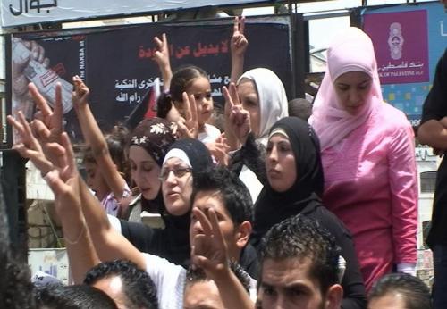 Palestinian Women's Demonstration against the attack on Gaza, Jerusalem. Artur Zmijewski ‘Democracies’