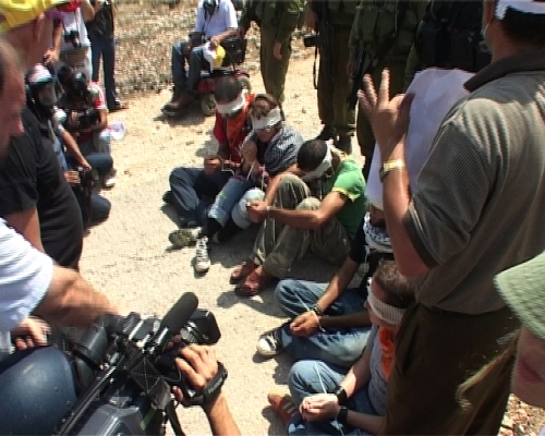 David Reeb, video-still of Bil'in demonstration, August, 2010
